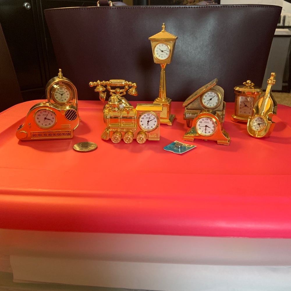 9 piece collection set of miniature quartz clocks
